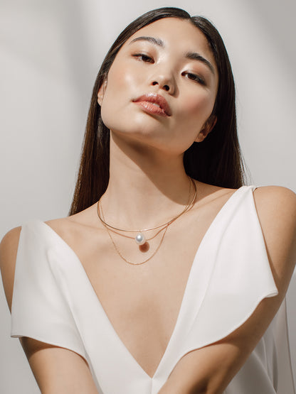 LOVE gold necklace with South Sea pearls