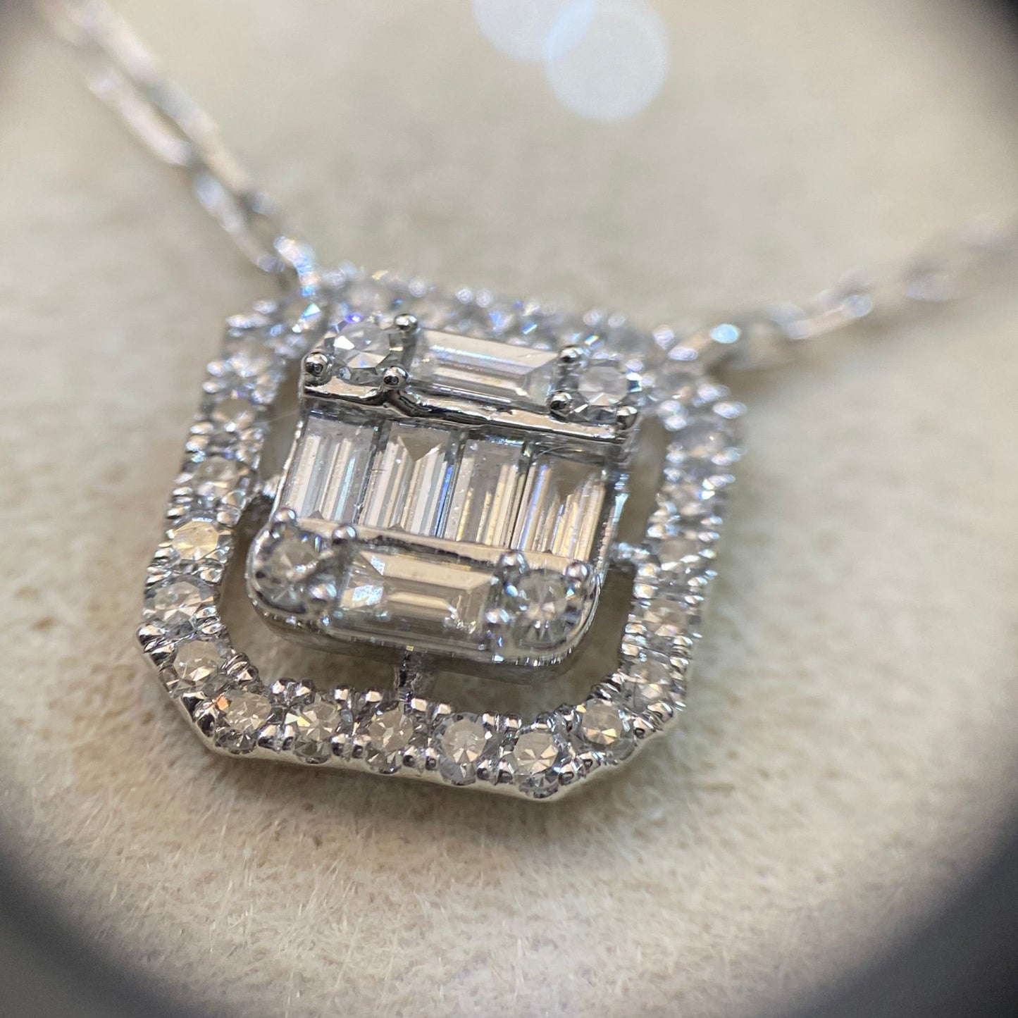 White gold diamond baguette necklace