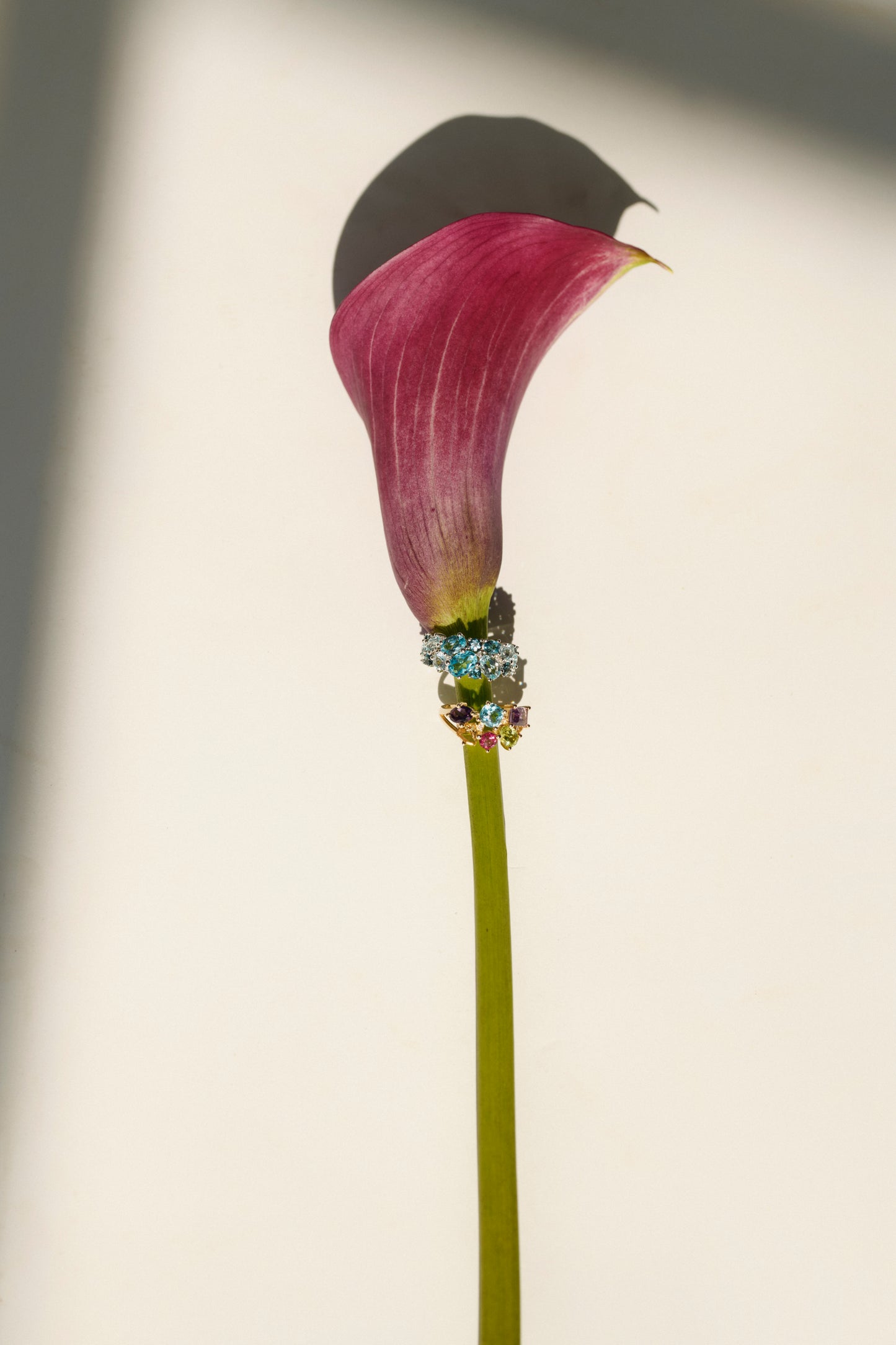 Yellow gold gemstone ring with colored topaz